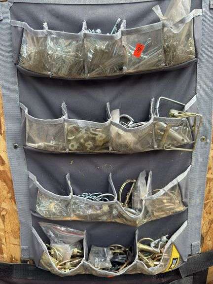 Assorted lot of pin hardware with storage bin image