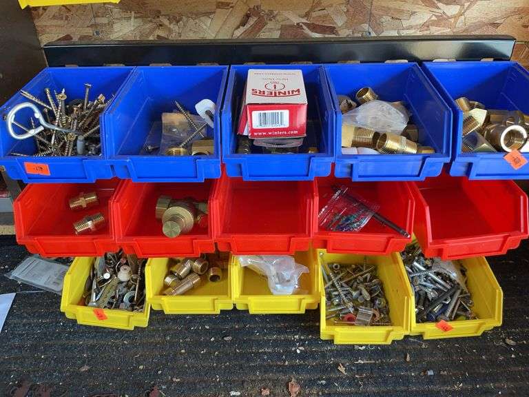 15 plastic storage containers with bracket and contents image