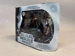 Darth Vader, old mean guy, and Storm trooper action figure