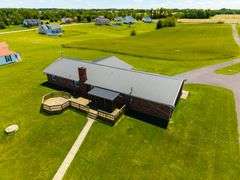 11324 Rineyville Road • Vine Grove, KY TWO HOMES • FINISHED METAL BUILDING (BARNDOMINIUM) • 70'x40' BARN • 9± ACRES