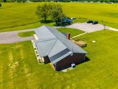 11324 Rineyville Road • Vine Grove, KY TWO HOMES • FINISHED METAL BUILDING (BARNDOMINIUM) • 70'x40' BARN • 9± ACRES
