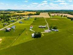 11324 Rineyville Road • Vine Grove, KY TWO HOMES • FINISHED METAL BUILDING (BARNDOMINIUM) • 70'x40' BARN • 9± ACRES