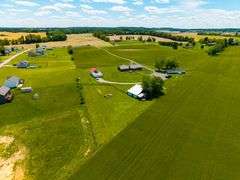 11324 Rineyville Road • Vine Grove, KY TWO HOMES • FINISHED METAL BUILDING (BARNDOMINIUM) • 70'x40' BARN • 9± ACRES