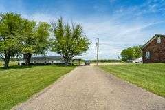 11324 Rineyville Road • Vine Grove, KY TWO HOMES • FINISHED METAL BUILDING (BARNDOMINIUM) • 70'x40' BARN • 9± ACRES