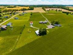 11324 Rineyville Road • Vine Grove, KY TWO HOMES • FINISHED METAL BUILDING (BARNDOMINIUM) • 70'x40' BARN • 9± ACRES