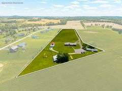 11324 Rineyville Road • Vine Grove, KY TWO HOMES • FINISHED METAL BUILDING (BARNDOMINIUM) • 70'x40' BARN • 9± ACRES