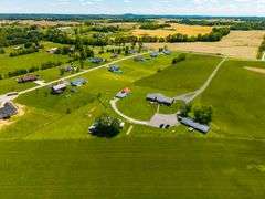 11324 Rineyville Road • Vine Grove, KY TWO HOMES • FINISHED METAL BUILDING (BARNDOMINIUM) • 70'x40' BARN • 9± ACRES