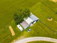 11324 Rineyville Road • Vine Grove, KY TWO HOMES • FINISHED METAL BUILDING (BARNDOMINIUM) • 70'x40' BARN • 9± ACRES