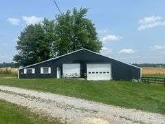 11324 Rineyville Road • Vine Grove, KY TWO HOMES • FINISHED METAL BUILDING (BARNDOMINIUM) • 70'x40' BARN • 9± ACRES