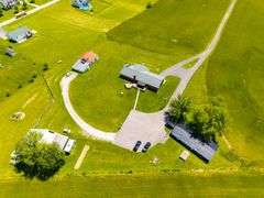 11324 Rineyville Road • Vine Grove, KY TWO HOMES • FINISHED METAL BUILDING (BARNDOMINIUM) • 70'x40' BARN • 9± ACRES