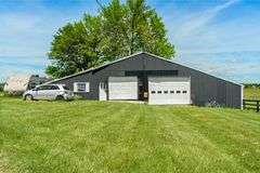 11324 Rineyville Road • Vine Grove, KY TWO HOMES • FINISHED METAL BUILDING (BARNDOMINIUM) • 70'x40' BARN • 9± ACRES