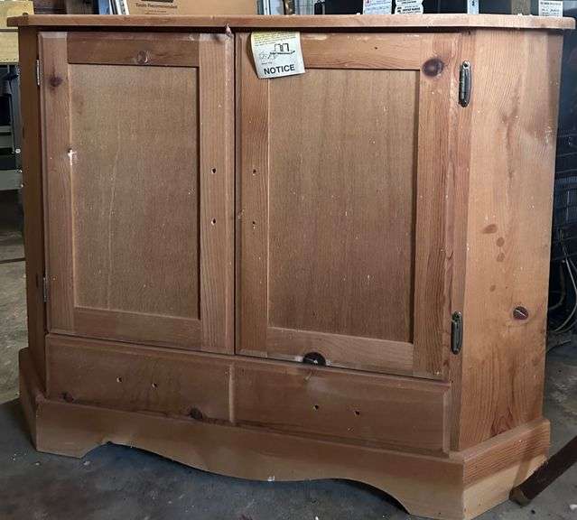 Rustic Wood Cabinet with Doors and Angled Top image