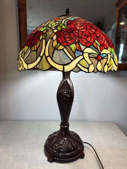 Stained glass style red rose lamp with decorative base. Lamp approximately 26" tall, shade approximately 18" wide