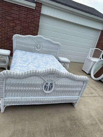 Rattan full size bed with mattress and box spring. 2 night stands