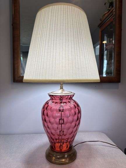 Cranberry optic dot brass lamp with pleated shade. 31" tall