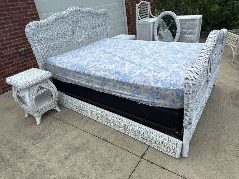 Rattan full size bed with mattress and box spring. 2 night stands