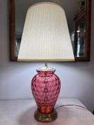 Cranberry optic dot brass lamp with pleated shade. 31" tall