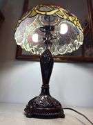 Stained glass style red rose lamp with decorative base. Lamp approximately 26" tall, shade approximately 18" wide