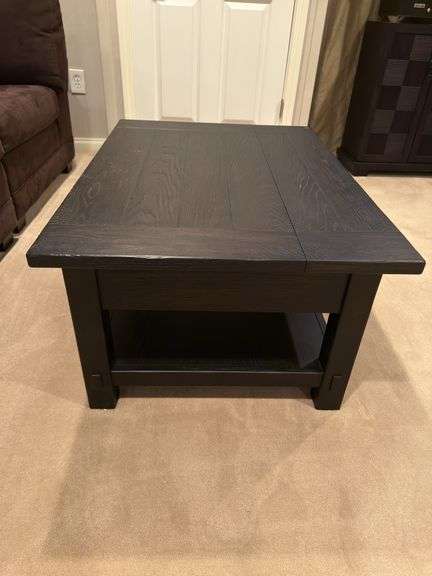 Coffee table with lift up top for storage