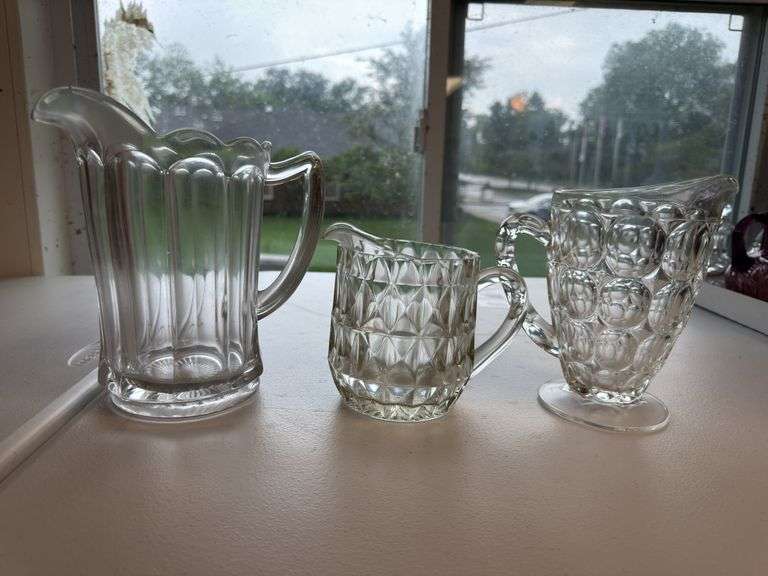 Glass pitchers as shown