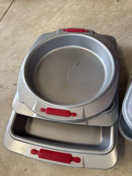 Lot of baking pans and covered kitchenware