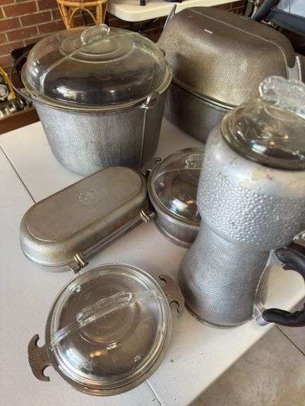 Aluminum serving pieces, most “Guardian Services”