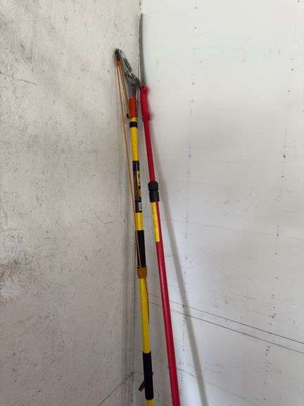 2 tree saws on poles