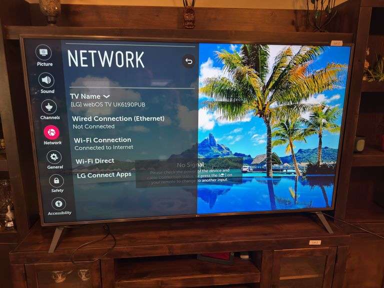 LG 75” TV UK6190PUB 4k HDR Smart UHD TV. Approximately 66” wide by 41” tall.
