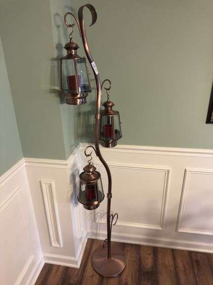 Metal candle holder on stand. 72” tall