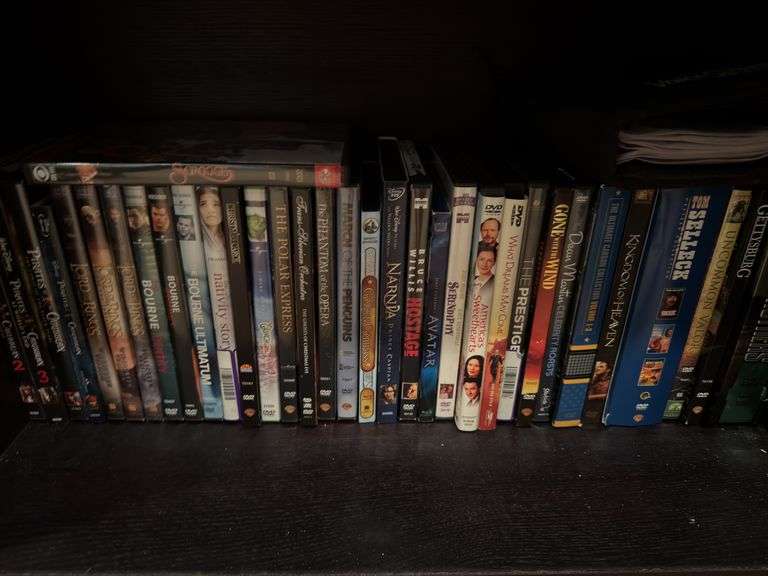 Pressed wood chest with DVD’s included