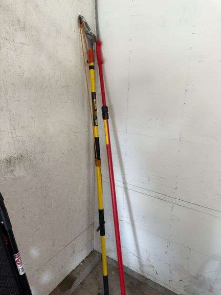 2 tree saws on poles