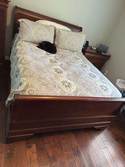 Queen size sleigh bed - frame only. No mattress, box spring or linens.