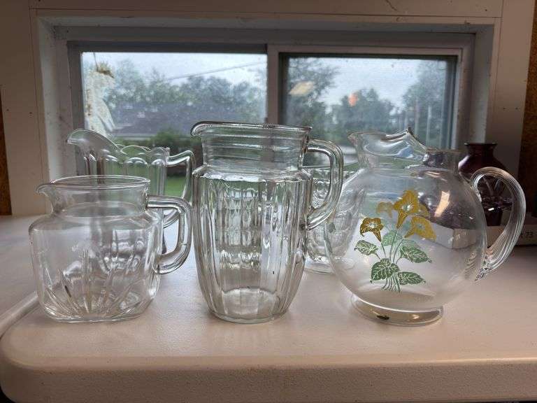Glass pitchers as shown