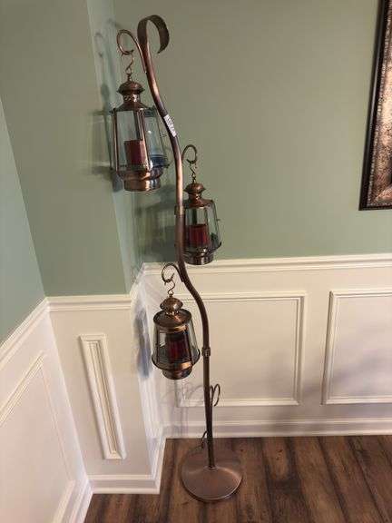 Metal candle holder on stand. 72” tall