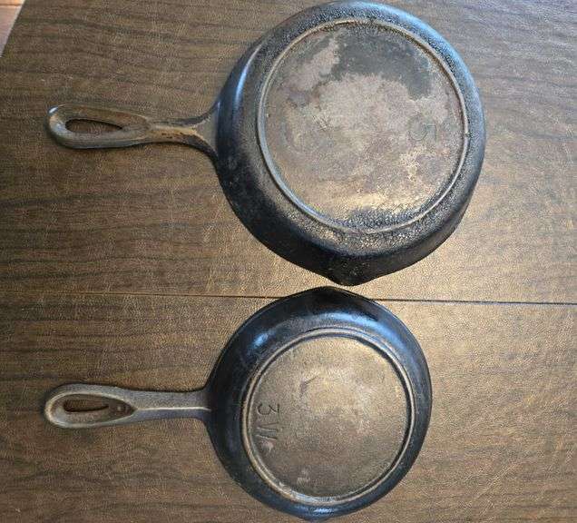 2 small cast iron pans