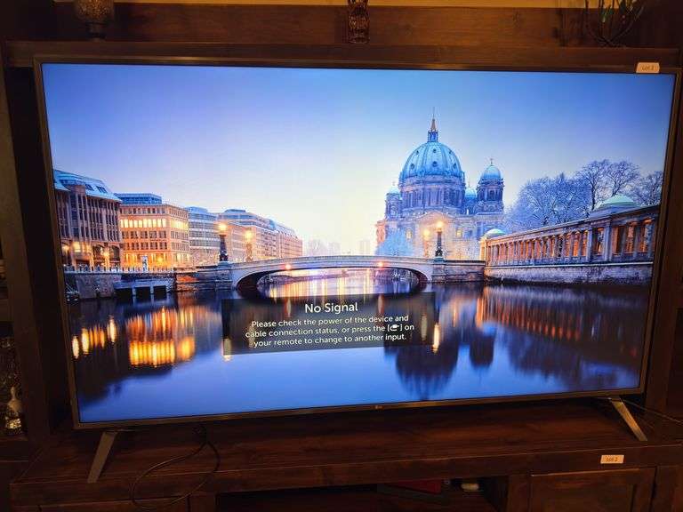 LG 75” TV UK6190PUB 4k HDR Smart UHD TV. Approximately 66” wide by 41” tall.