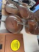 Lot of copper chef pots and pans as shown