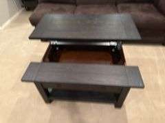Coffee table with lift up top for storage