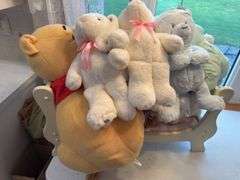 Large lot of dolls and stuffed animals