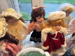 Porcelain dolls as shown
