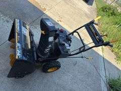 Yard Machines snow blower, 8HP, 24”. Started on first pull
