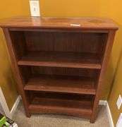 Pressed wood book shelf