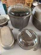 Aluminum serving pieces, most “Guardian Services”