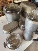 Aluminum serving pieces, most “Guardian Services”