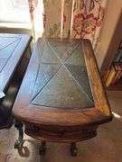 Set of 3 end tables with slate tops 14” wide by 23” deep by 25” tall