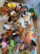Beanie babies and Toy Story dolls as shown