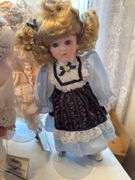 Porcelain dolls as shown