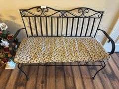 Metal bench with cushion