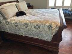Queen size sleigh bed - frame only. No mattress, box spring or linens.