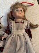 Porcelain dolls as shown